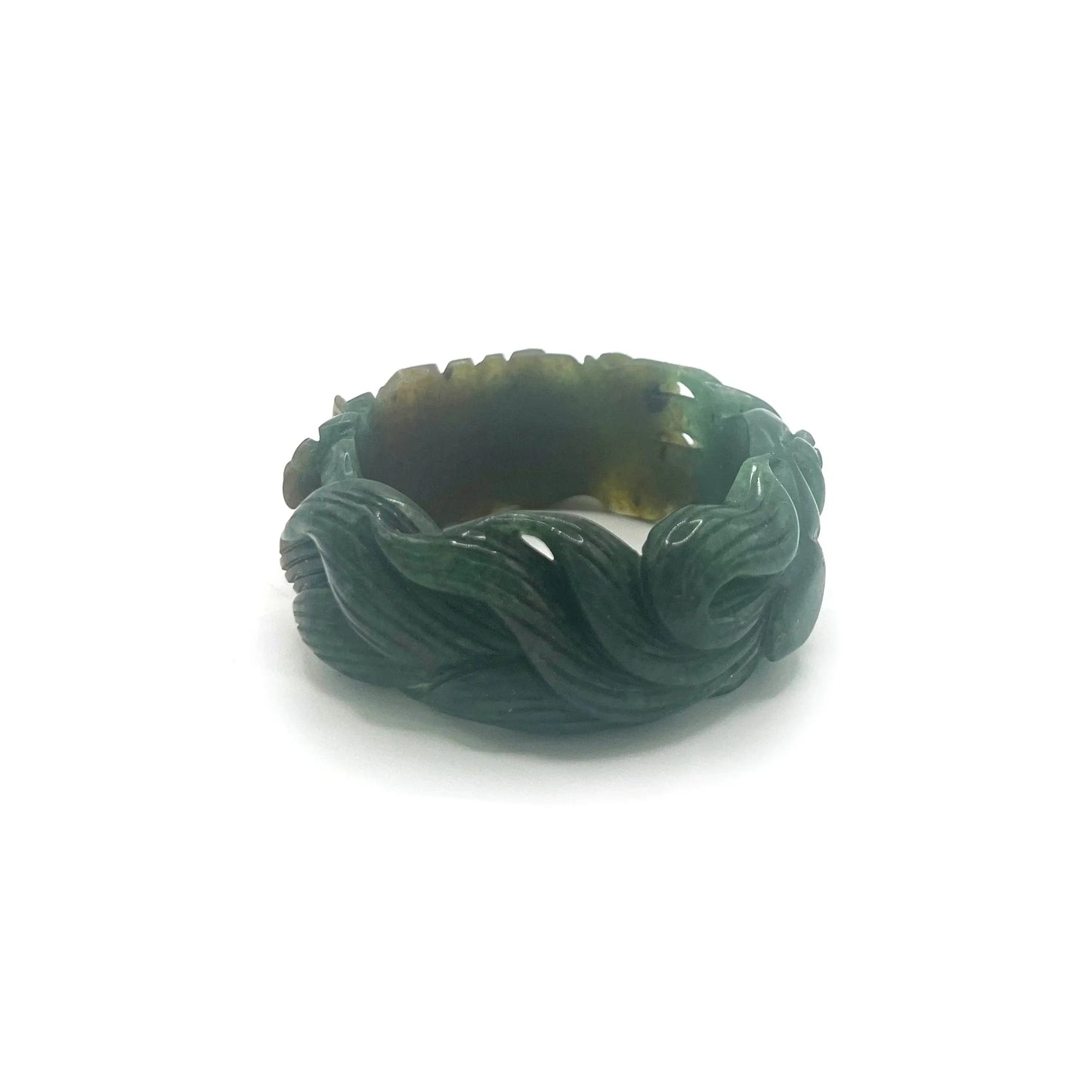 Carved jade bracelet in emerald Mongolian quartzite, featuring hand-carved peony and nine-tailed kitsune symbols with vibrant yellow detailing.