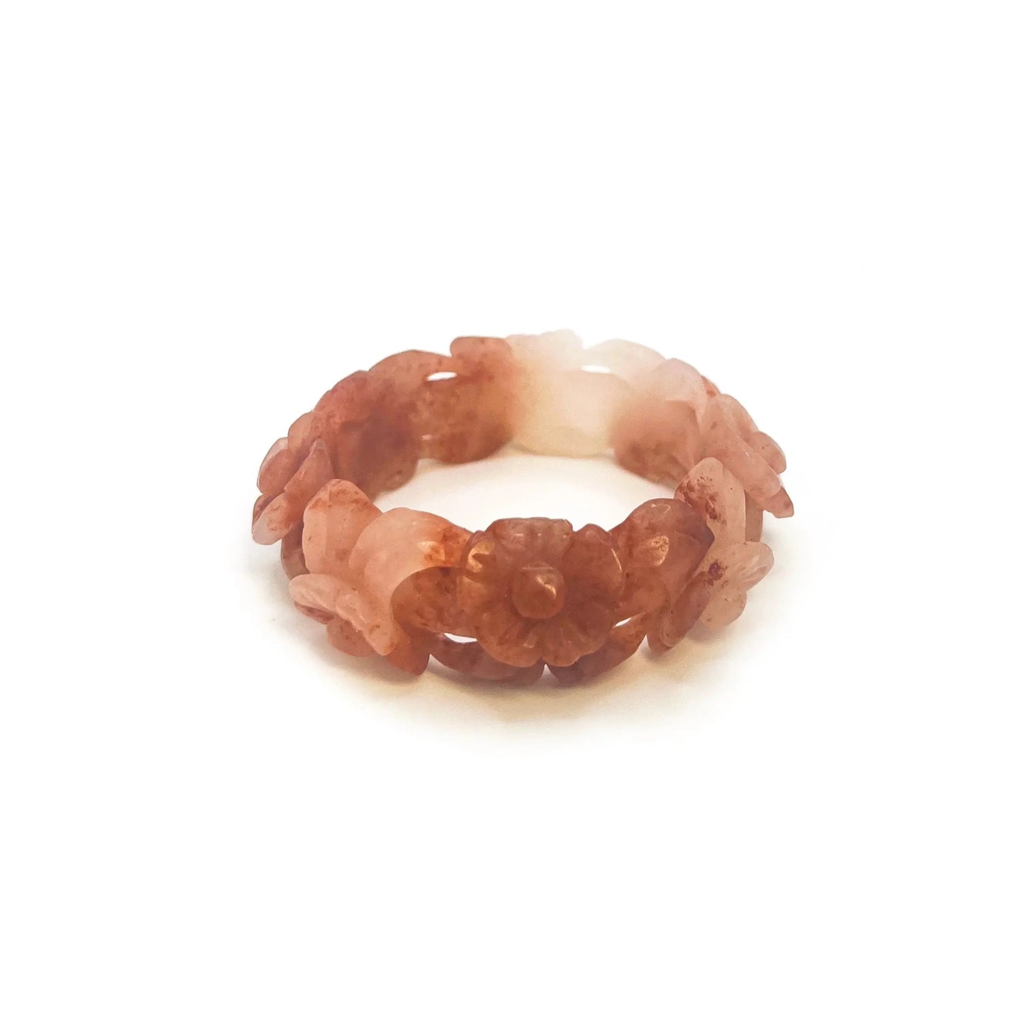 Bangle for small wrists featuring hand-carved cherry blossom motifs in vibrant red and translucent white natural stone with a hollowed, floral design.