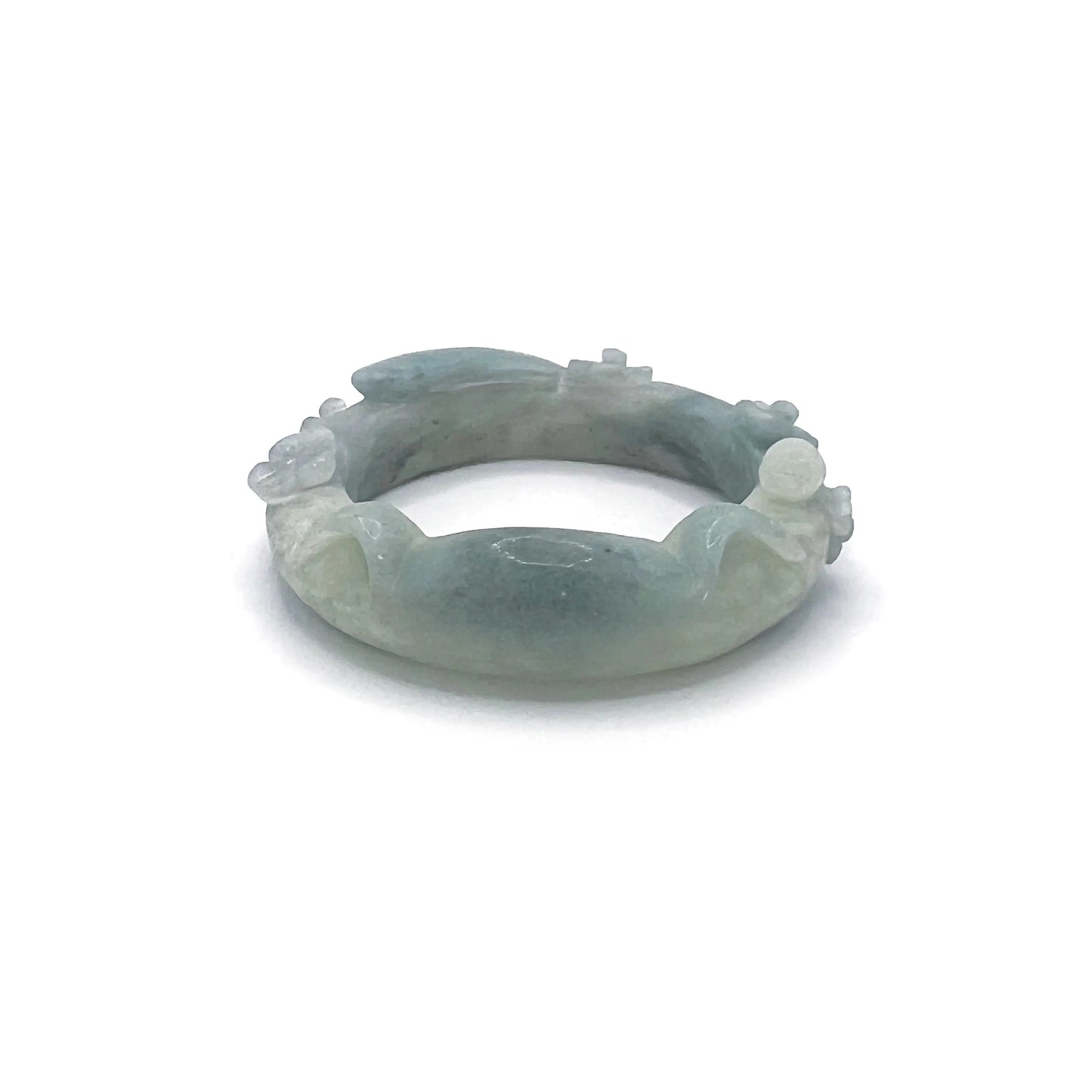 Hand-carved Sky Whiskers Cat Ear jade bangle with feline motifs in sky-blue Mongolian Quartzite.