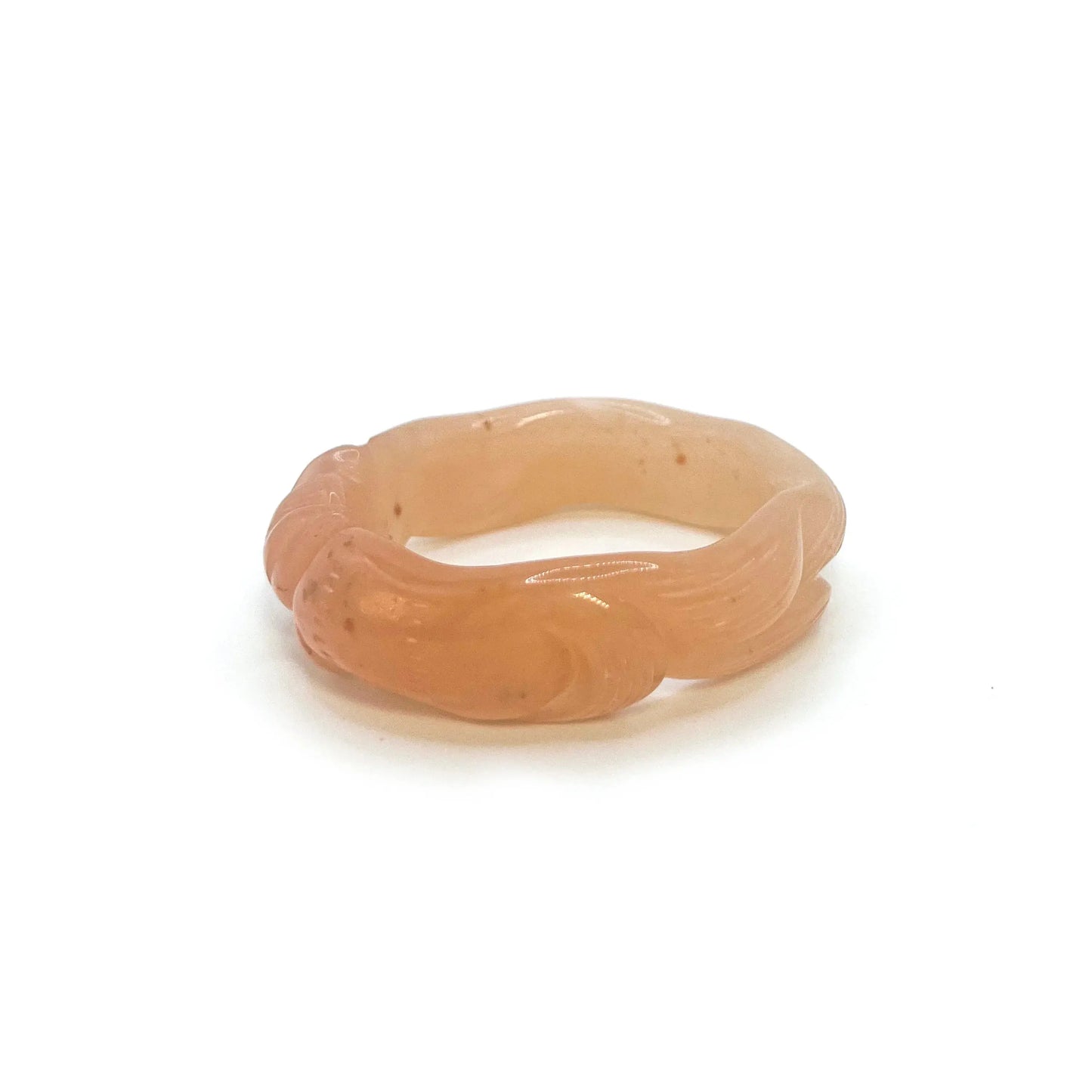 Carved jade bangle with hand-carved Kitsune and red maple leaf motifs on orange Mongolian quartzite, symbolizing autumn, wisdom, and spiritual transformation.