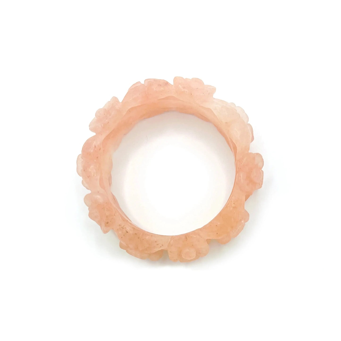 Carved jade bangle with dual-layer floral design in pink and orange Mongolian jade, hand-carved for artisan elegance and natural sunset beauty.