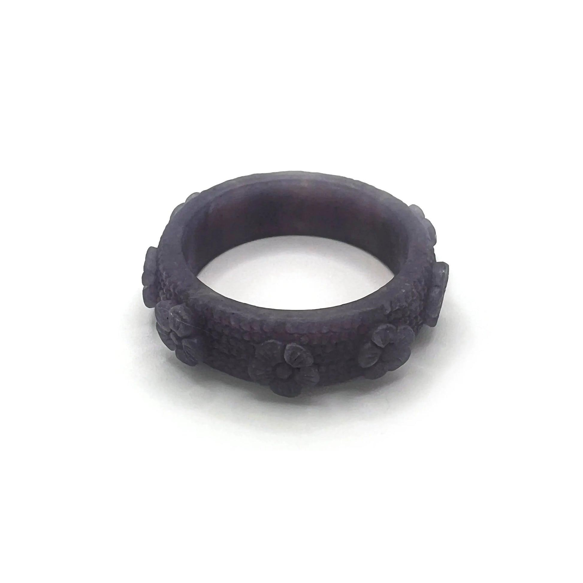 Carved bangle made from deep purple Mongolian jade, featuring delicate vintage floral engravings spaced evenly around the bracelet for an elegant, romantic look.