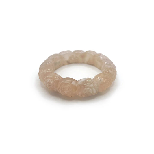 Carved bangle bracelet made from white Mongolian jade quartzite, featuring a full circle of delicate hand-carved cherry blossoms in a translucent floral design. - Miruzi