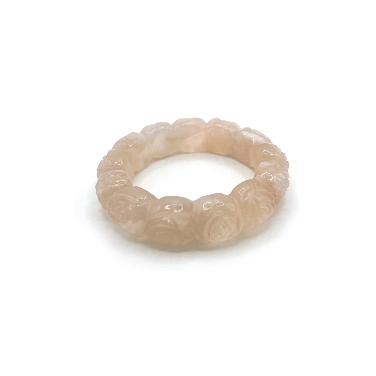 Carved bangle bracelet made from white Mongolian jade quartzite, featuring a full circle of delicate hand-carved cherry blossoms in a translucent floral design. - Miruzi