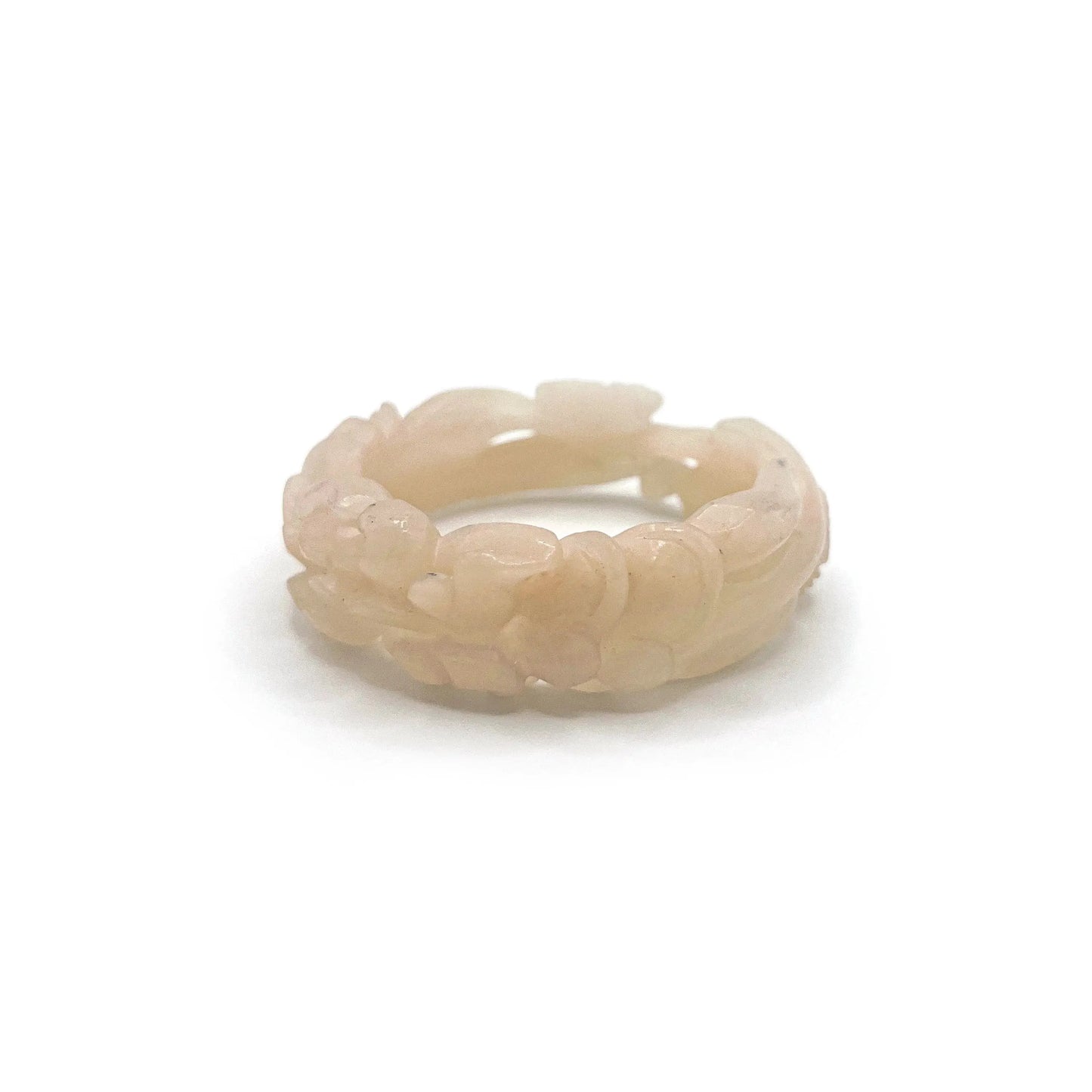 Rose bangle made from jelly-textured Mongolian jade, featuring delicately carved roses and snowflake inclusions in soft pink quartzite.