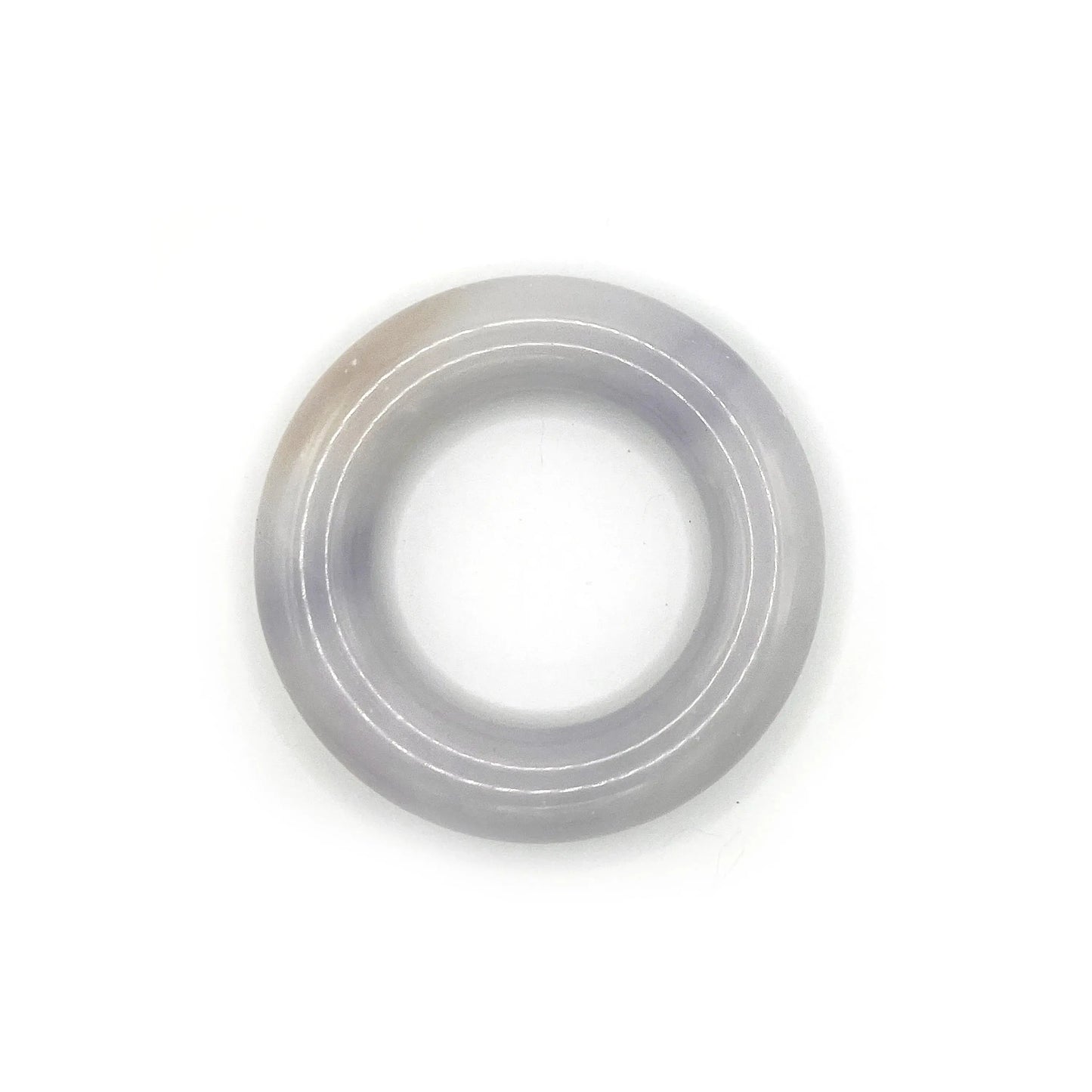 Donut bangle carved from Mongolian jade quartzite in soft lavender, featuring a smooth, rounded shape with translucent tones and natural artisan craftsmanship. - Miruzi