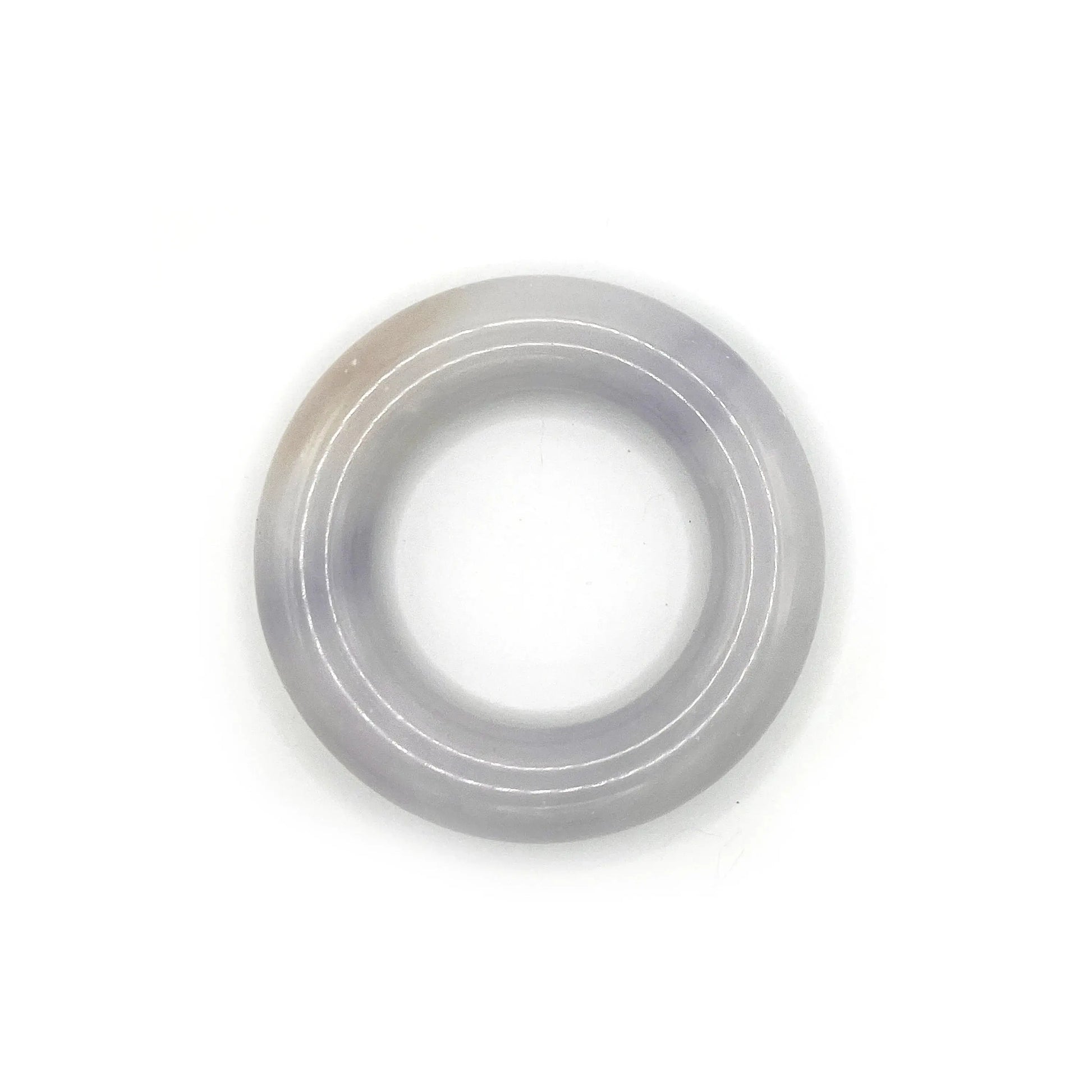 Donut bangle carved from Mongolian jade quartzite in soft lavender, featuring a smooth, rounded shape with translucent tones and natural artisan craftsmanship. - Miruzi