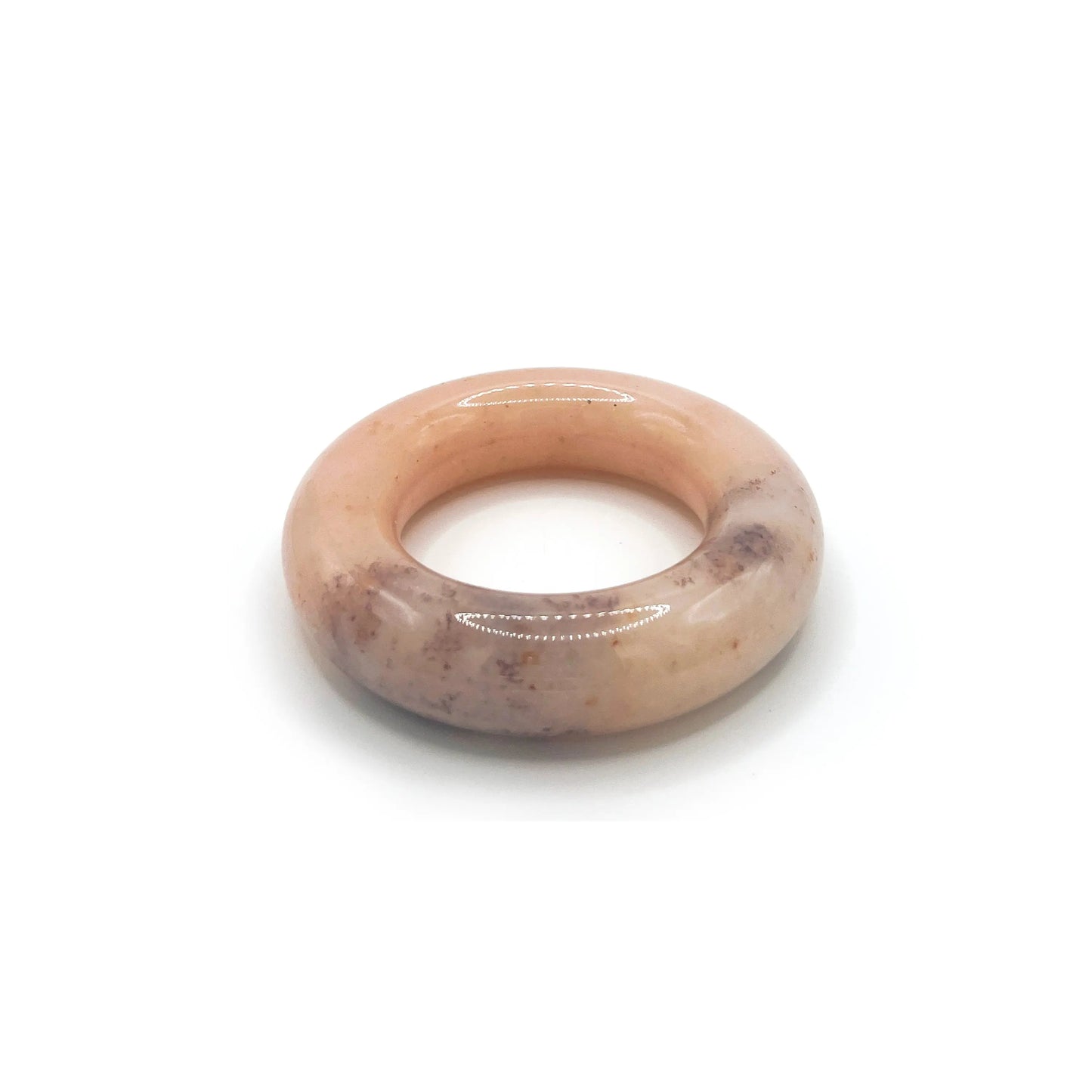 Peach Blossom Drift Donut Bangle Bracelet made from Mongolian jade quartzite in vibrant purple-red and peachy orange colors.