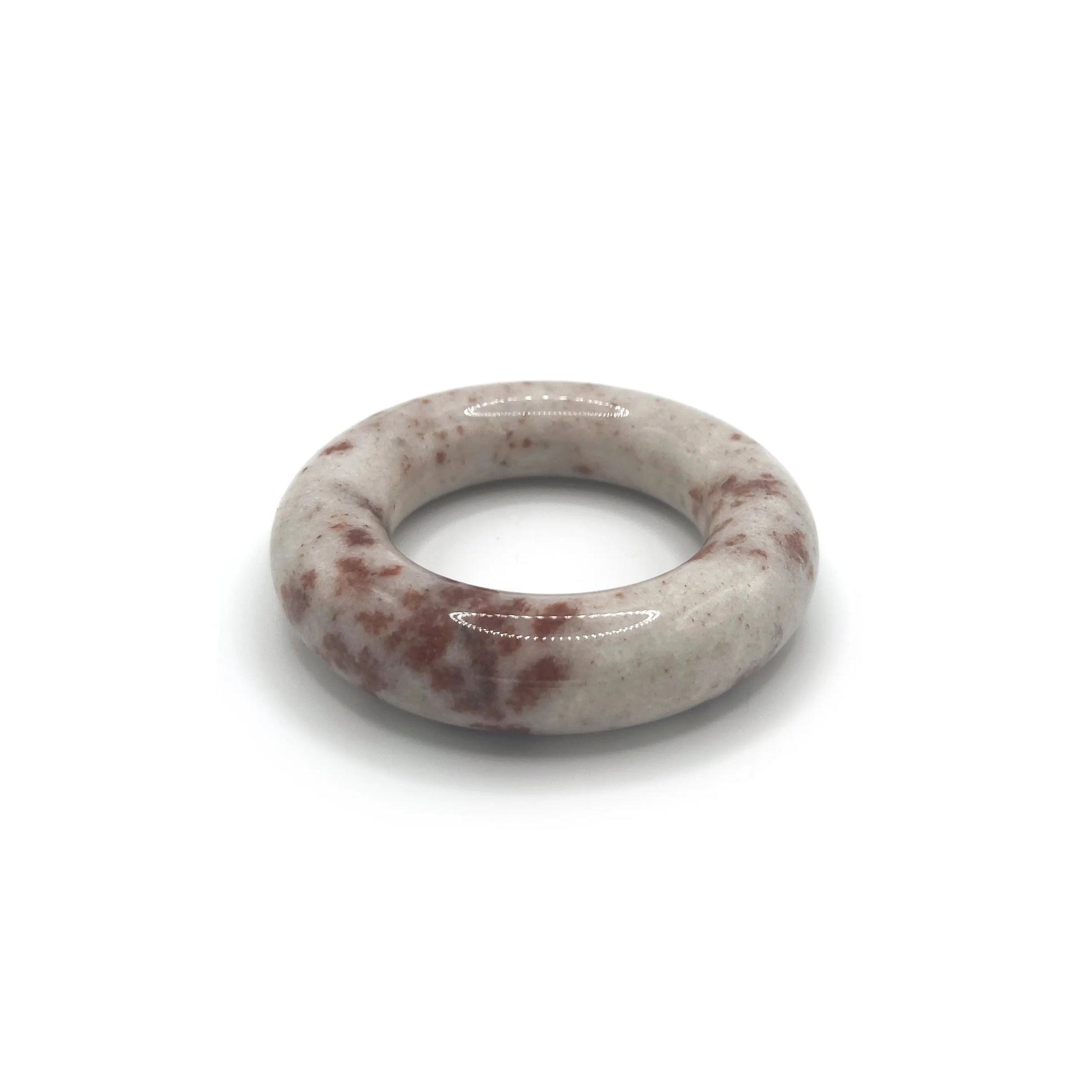Snow Blossom Trace red floral donut bangle bracelet on cream Mongolian jade.