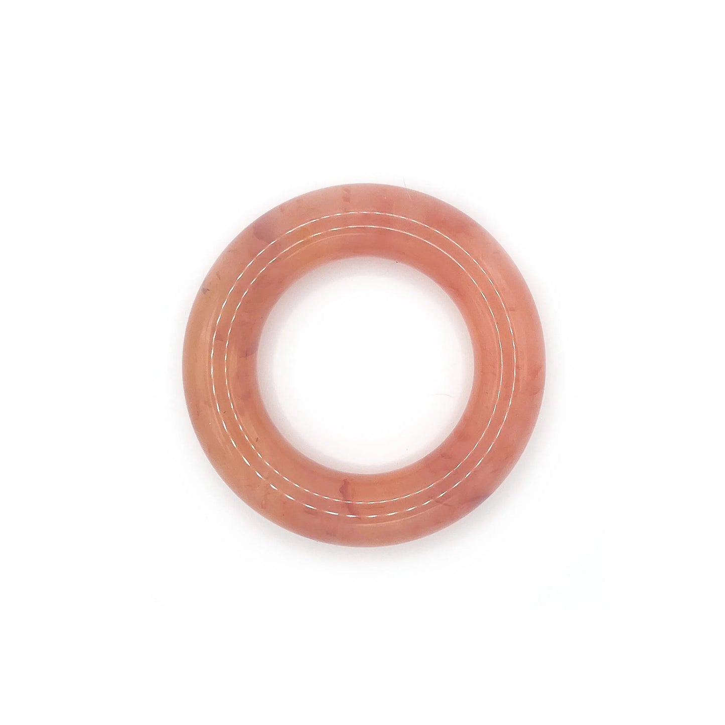 Donut bangle bracelet carved from Mongolian jade quartzite in translucent orange, featuring red petal accents and a smooth, jelly-like round silhouette. - Miruzi