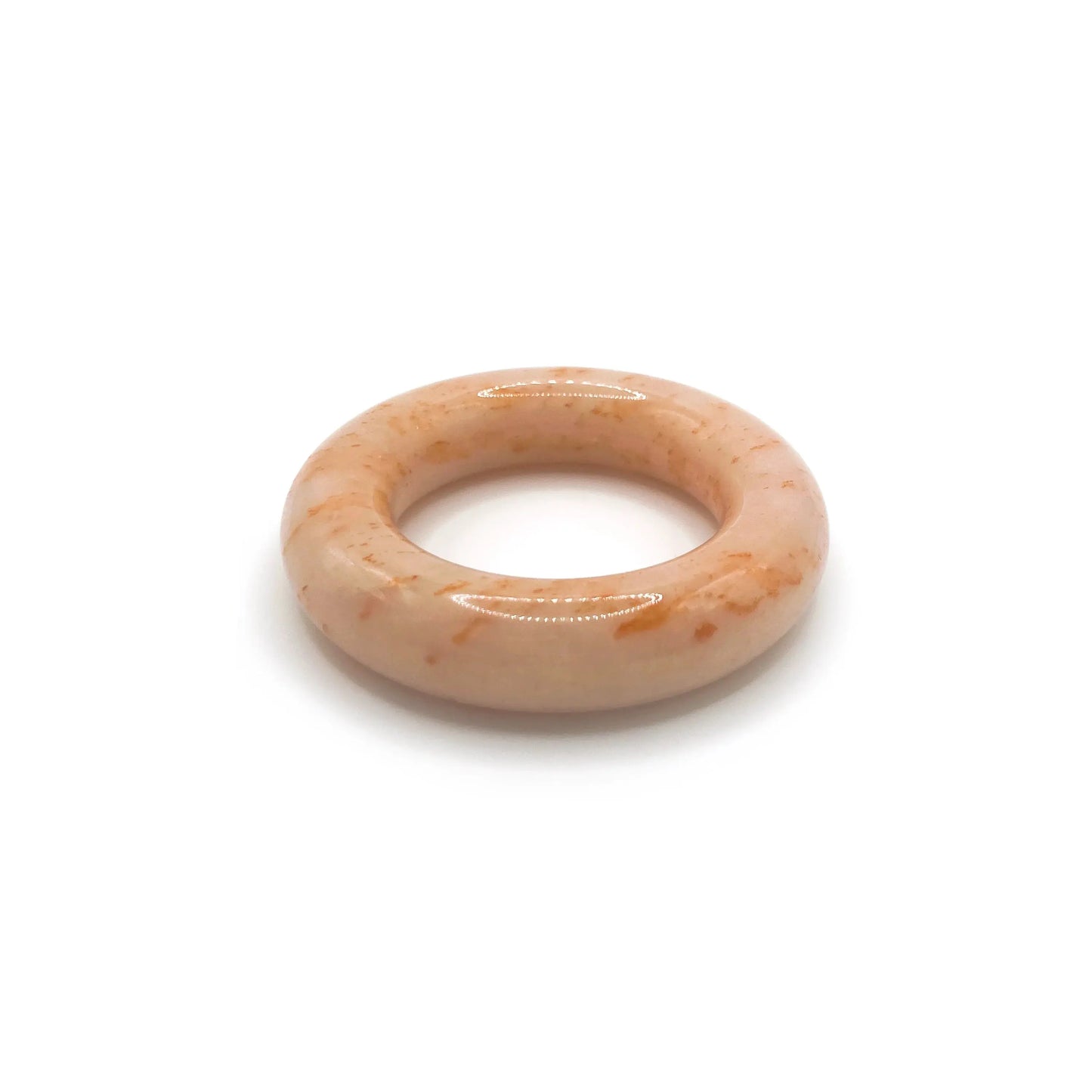 Donut bangle bracelet made of Mongolian jade quartzite in bright orange with jelly-like swirls, featuring a smooth rounded design for petite wrists.-Miruzi
