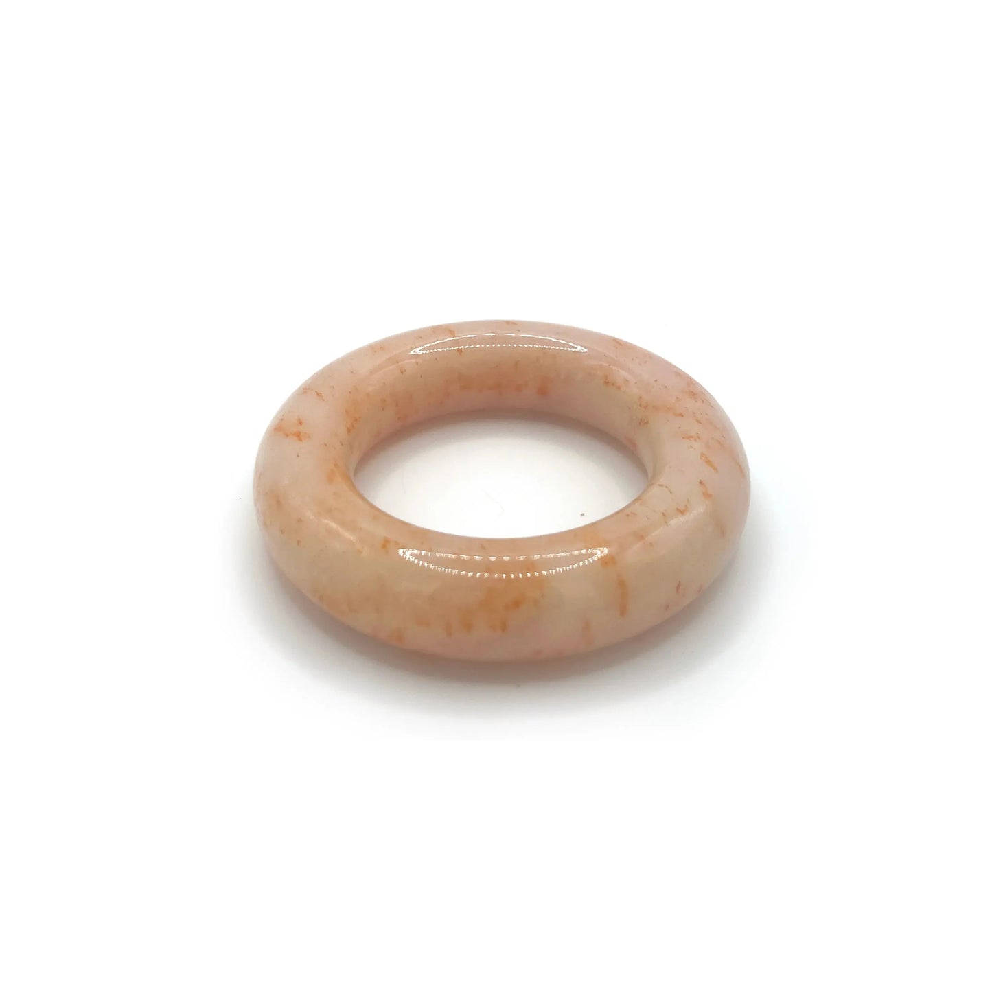 Donut bangle bracelet made of Mongolian jade quartzite in bright orange with jelly-like swirls, featuring a smooth rounded design for petite wrists.-Miruzi