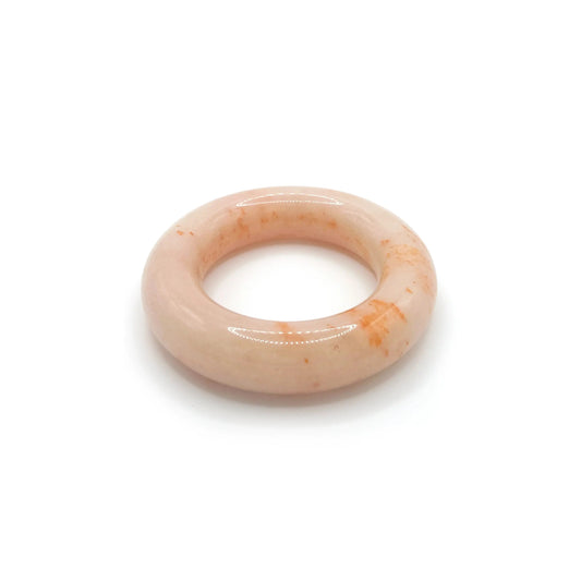 Donut bangle bracelet made of Mongolian jade quartzite in bright orange with jelly-like swirls, featuring a smooth rounded design for petite wrists.-Miruzi