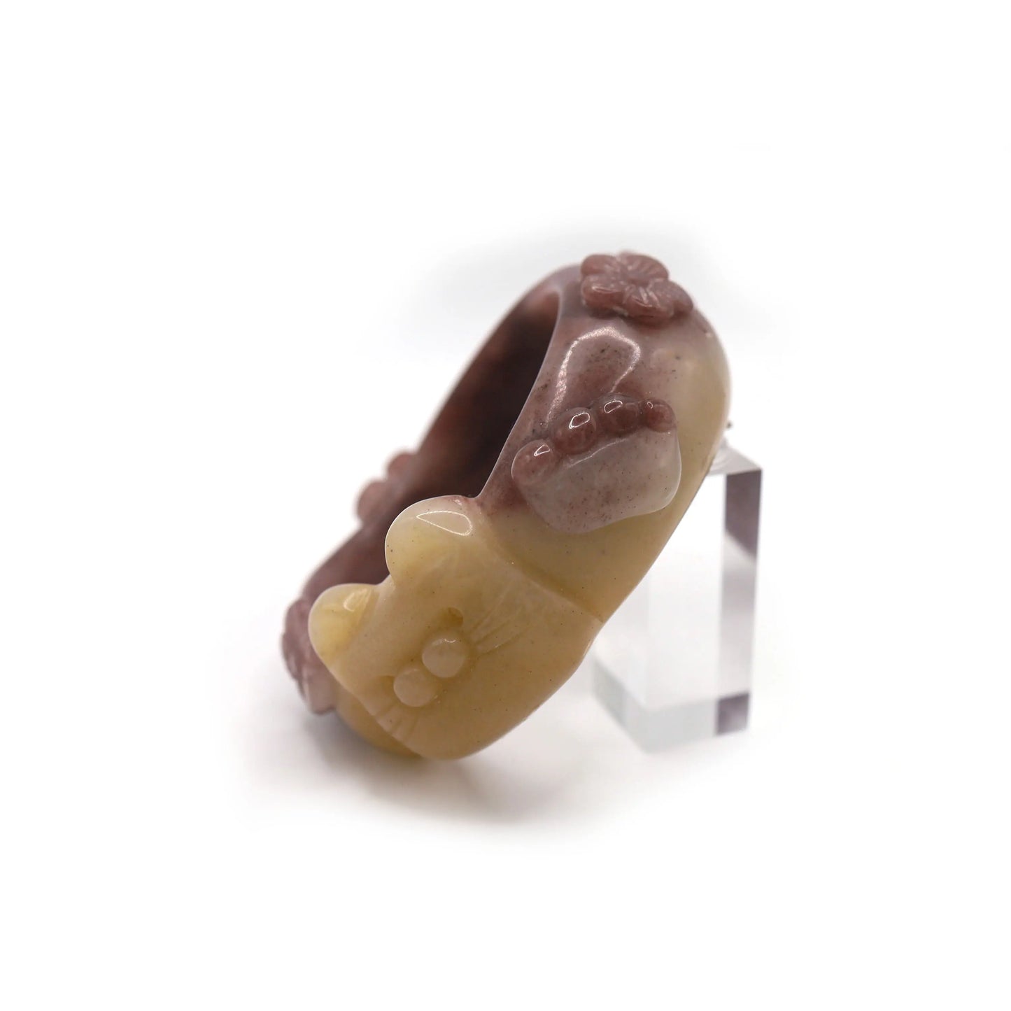 Wide Mongolian jade bracelet showcasing a cat face on one side and paws and tail on the other, blending motion and whimsy in stone – Miruzi