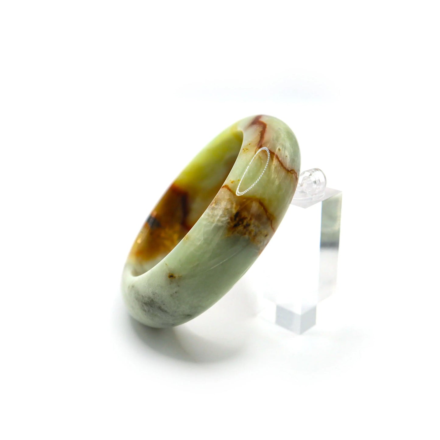 Classic full-circle jade bangle on a clean white surface for product clarity Miruzi