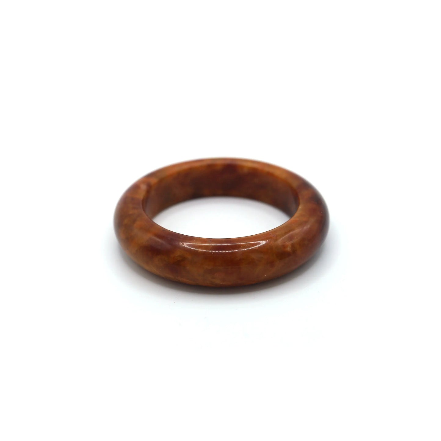 Crimson jade bracelet inside a soft jewelry pouch showing natural variations Miruzi