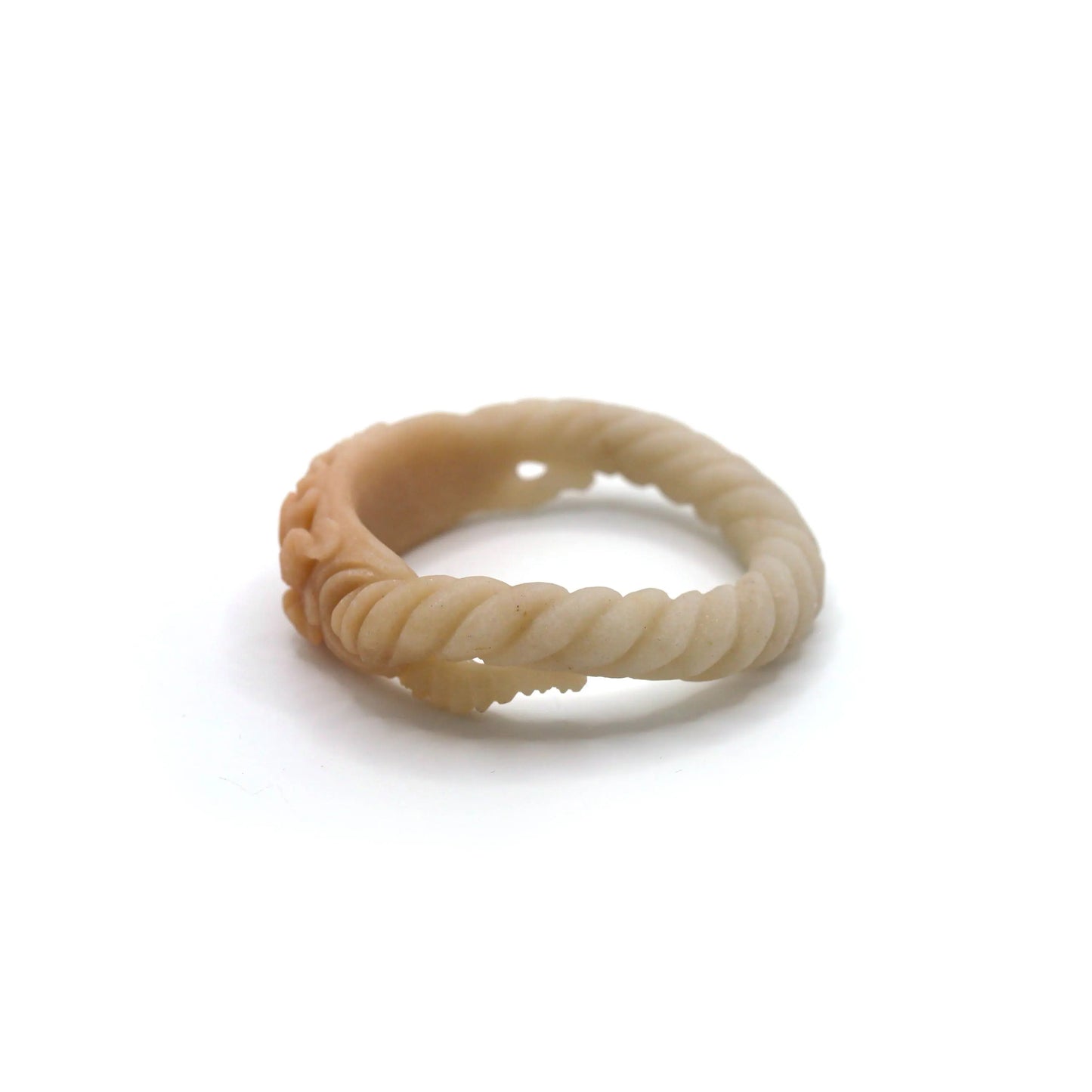 Polished quartzite jade bracelet with softly twisted beige band and sculpted floral plaque that symbolizes abundance and grace – Miruzi