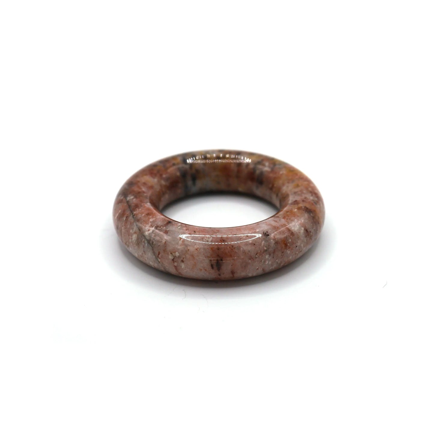 Light pink jade bangle with fluid multicolor veins and specks, creating a textured, painterly effect in polished stone – Miruzi
