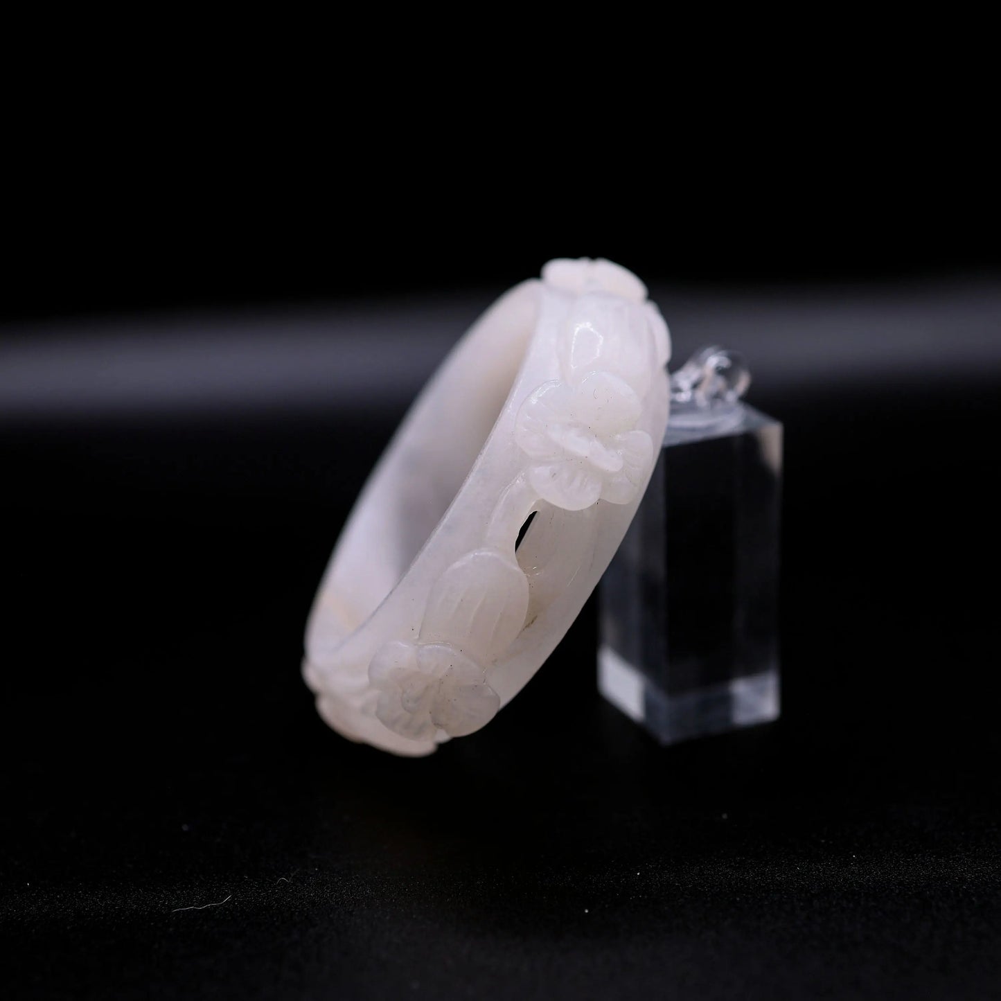 Softly polished white quartzite jade bracelet with full-relief violet blossoms cut into the surface, evoking poetic grace – Miruzi