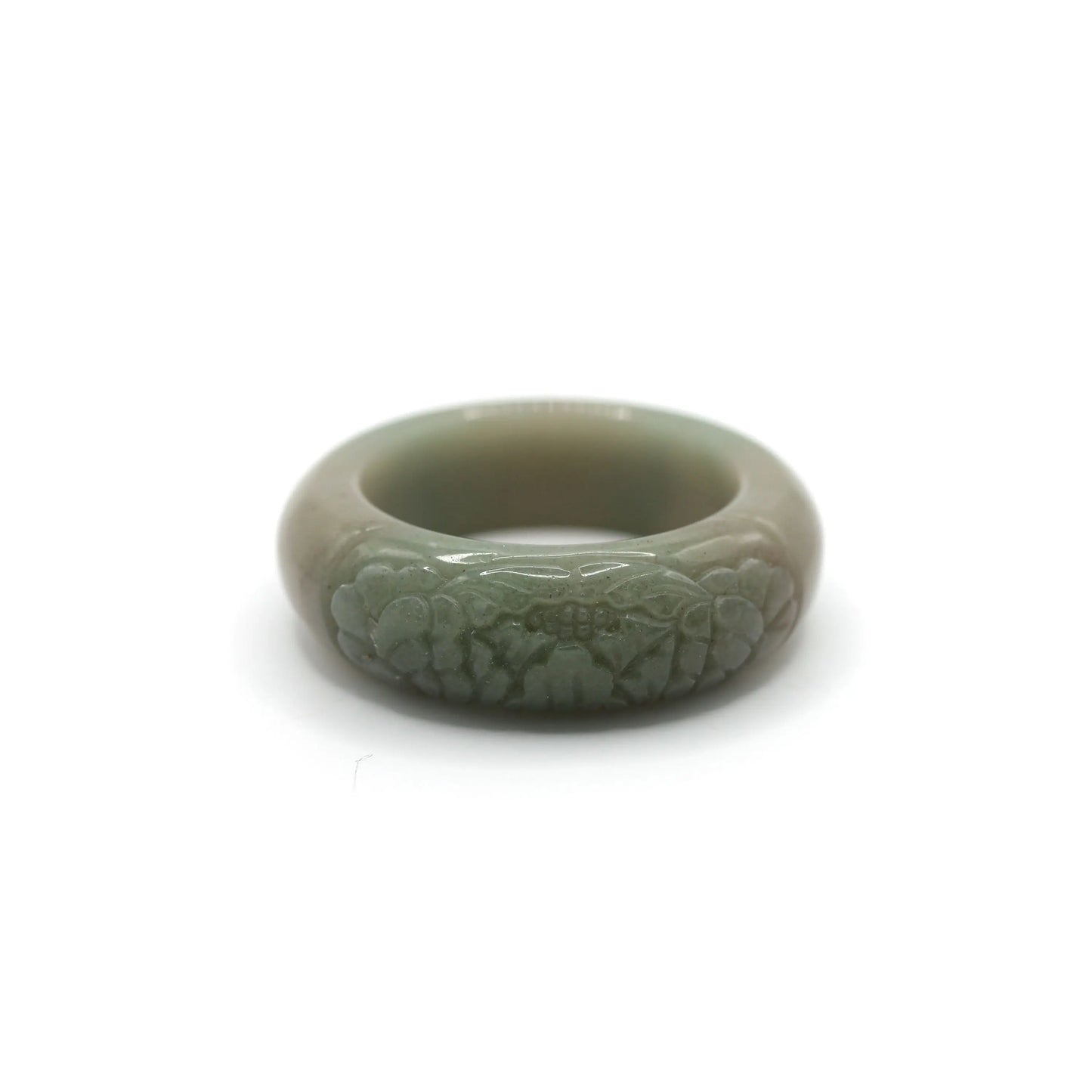 Soft green Mongolian jade bracelet with a single sculpted peony flower on one side, blending asymmetry with organic elegance – Miruzi