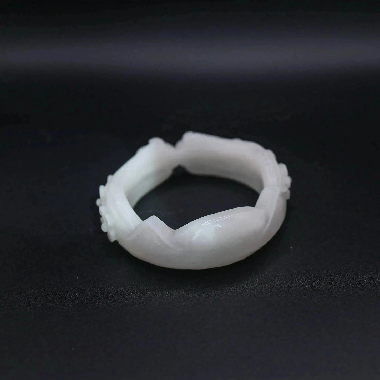 Artisan-crafted white jade bangle with sculpted feline ears, tiny paw prints, and symbolic floral motifs for animal lovers – Miruzi