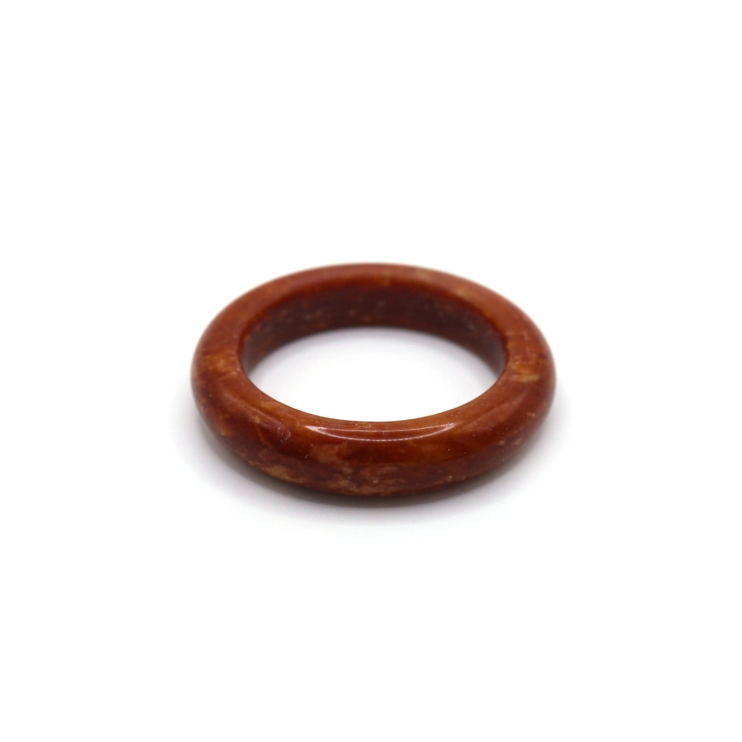 Red jade bracelet in soft-lined jewelry box for display and storage