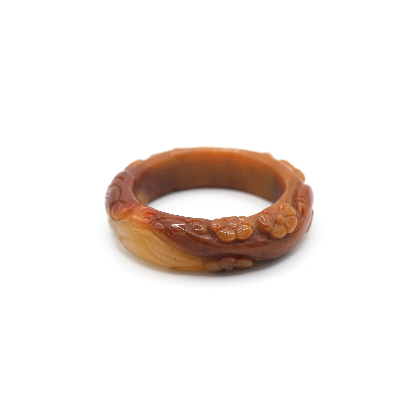 Mongolian jade bangle in rich orange hues, with delicate high-relief floral elements that shimmer with every movement – Miruzi