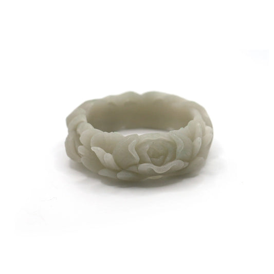 Artisan jade bracelet carved with a peaceful fox and full-bloom peony in pale green jade, representing intuition and compassion – Miruzi