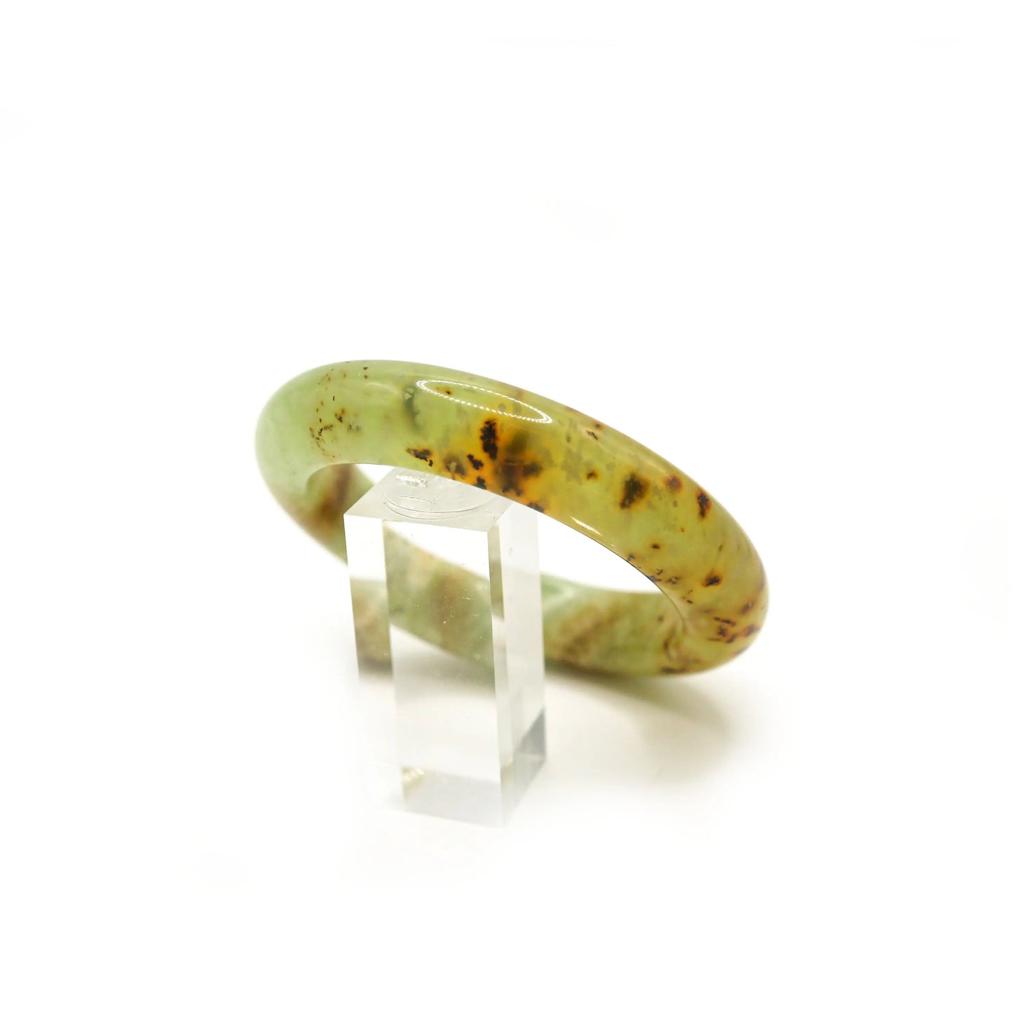 Honey jade bracelet in soft-lined jewelry box showing natural cloudy patterns - Miruzi