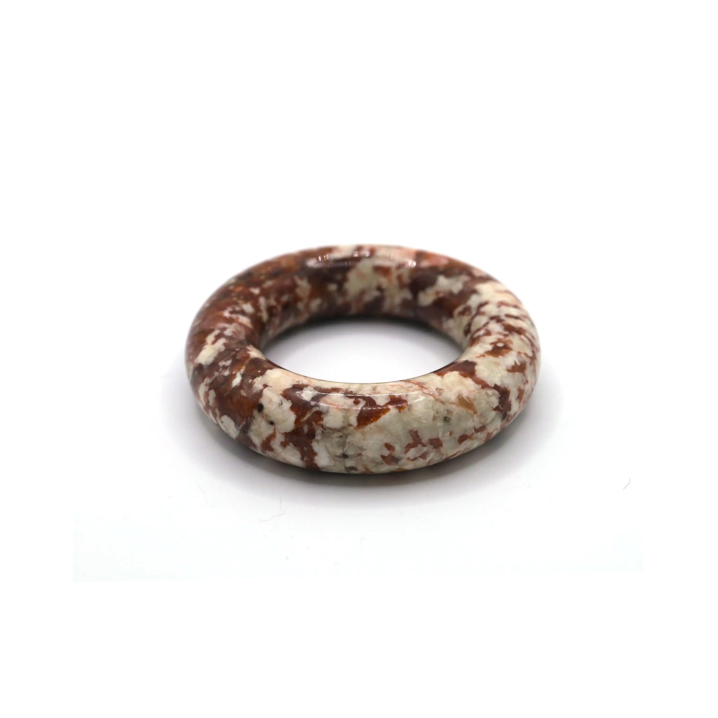 Polished round red jade bangle with a dense spread of natural white dots, styled to reflect cultural warmth and charm – Miruzi
