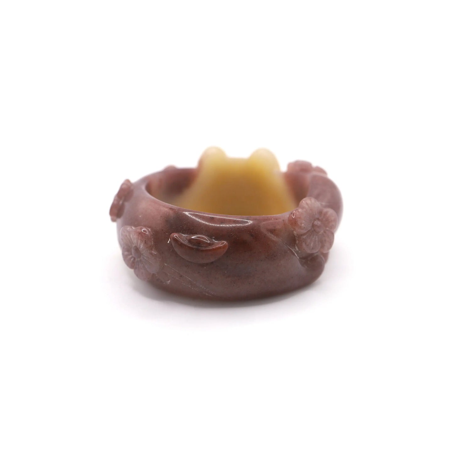 Full-circle jade bangle with feline face and floral motifs carved in relief, blending vibrant tones and natural storytelling – Miruzi