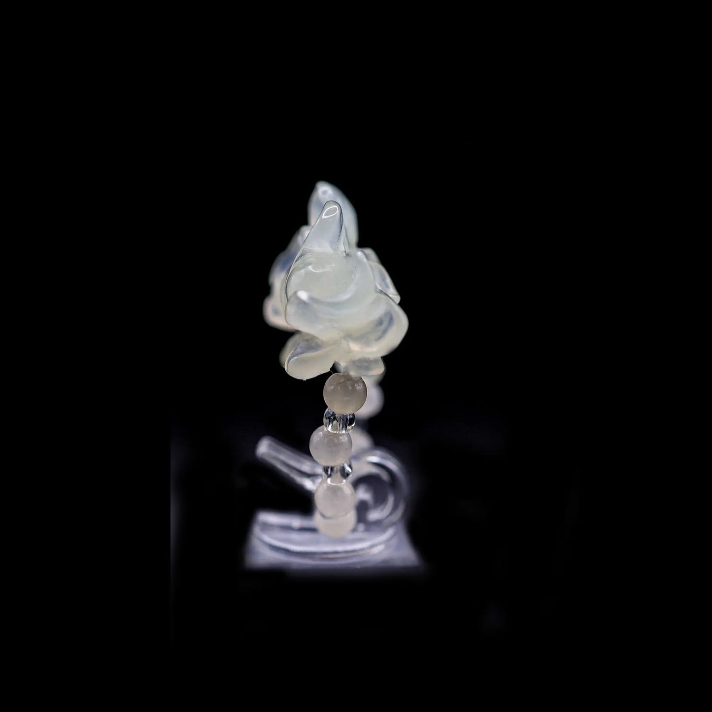 Handcrafted Serene Aqua Peony Adjustable Ring featuring a translucent, ice-clear serpentine base infused with a hint of pale aqua, showcasing a beautifully carved, three-dimensional peony. Perfect for summer, this ring combines ethereal beauty with the art of detailed craftsmanship, ideal for adding a touch of dreamy elegance to any outfit.