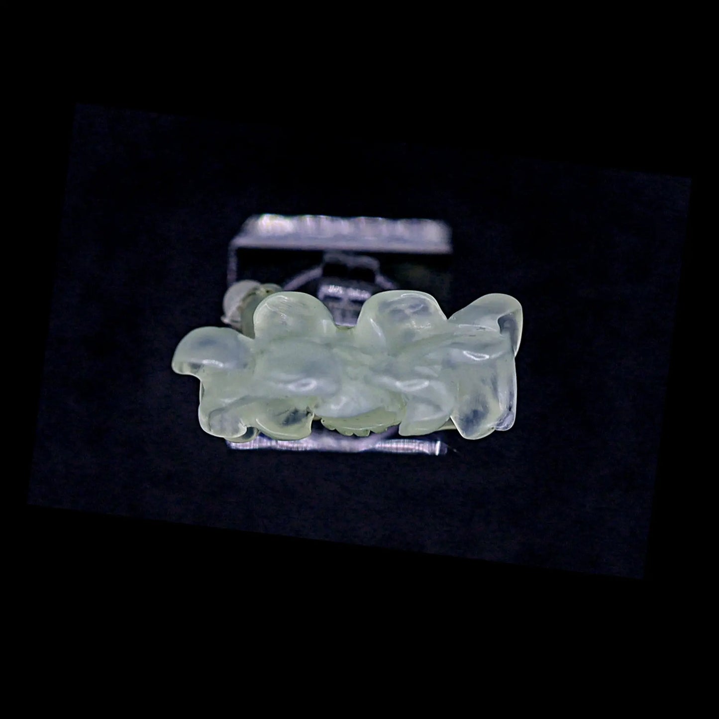 Handcrafted Serene Aqua Peony Adjustable Ring featuring a translucent, ice-clear serpentine base infused with a hint of pale aqua, showcasing a beautifully carved, three-dimensional peony. Perfect for summer, this ring combines ethereal beauty with the art of detailed craftsmanship, ideal for adding a touch of dreamy elegance to any outfit.