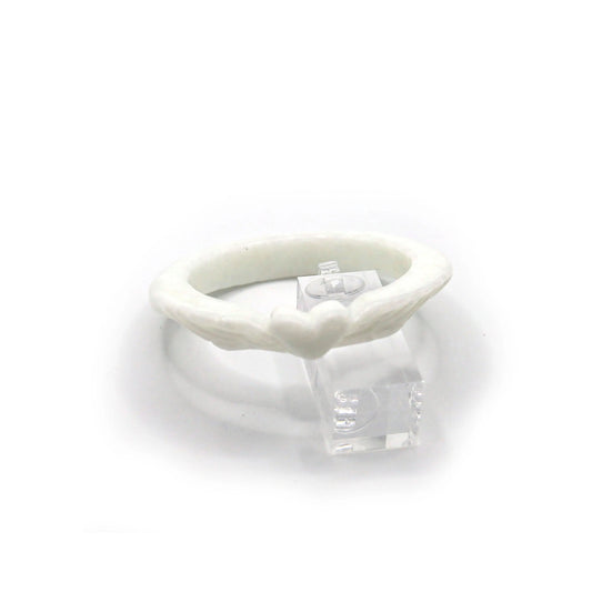 Slim Mongolian white jade bracelet with delicately carved heart at the center and feather designs on each side, glowing with soft translucence – Miruzi