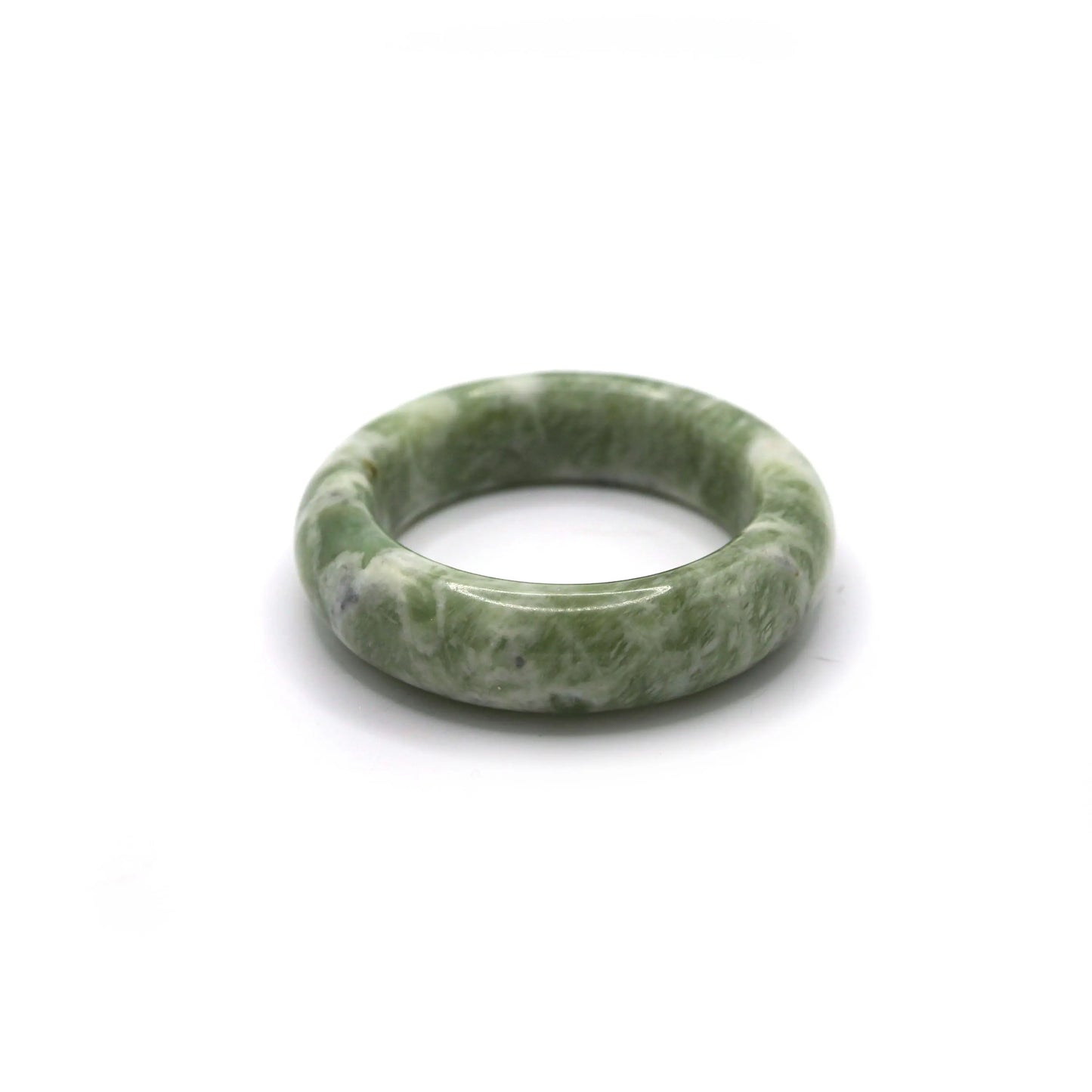 Woman wearing matcha green jade bracelet with pistachio-toned outfit - Miruzi
