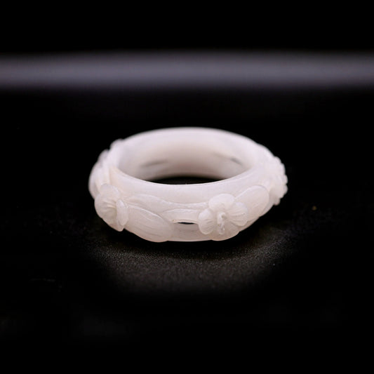 Pure white Mongolian jade bracelet featuring five openwork violet flowers carved in full relief, blending elegance with nature-inspired design – Miruzi