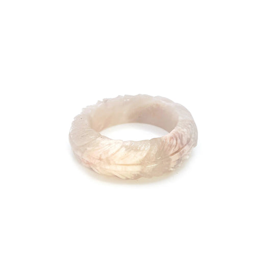 Feather bangle carved from translucent Mongolian jade in ivory, pink, and lavender tones with intricate feather designs and bold, modern shape. - Miruzi