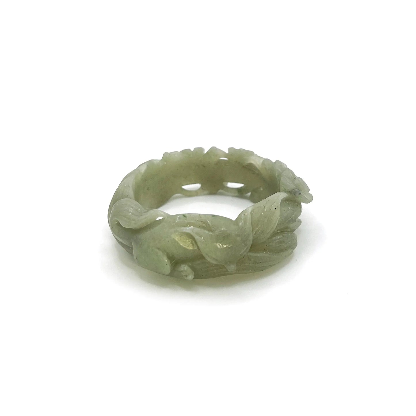 Fox bracelet carved from natural Mongolian jade, featuring a peaceful nine-tailed fox and hollow plum blossom design symbolizing serenity and resilience. - Miruzi