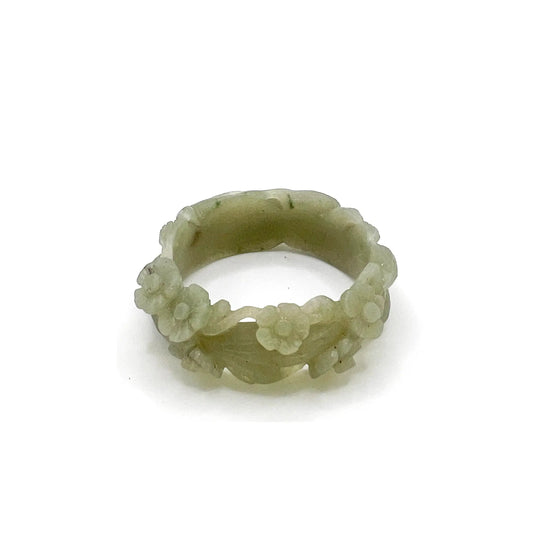 Fox bracelet carved from natural Mongolian jade, featuring a peaceful nine-tailed fox and hollow plum blossom design symbolizing serenity and resilience. - Miruzi