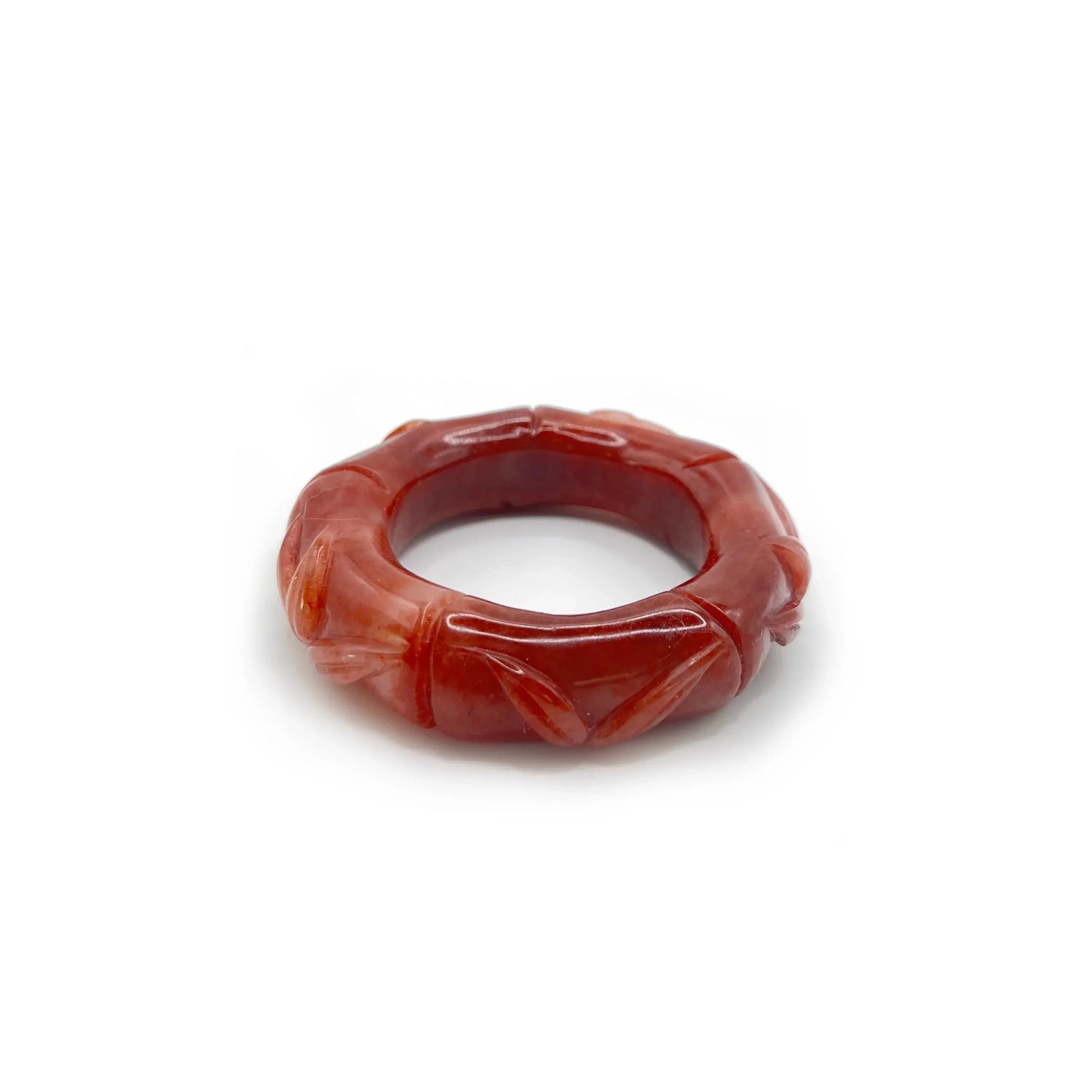 Bamboo bangle carved from red Mongolian jade quartzite with a glossy finish, featuring traditional segmented bamboo design symbolizing resilience and growth. - Miruzi