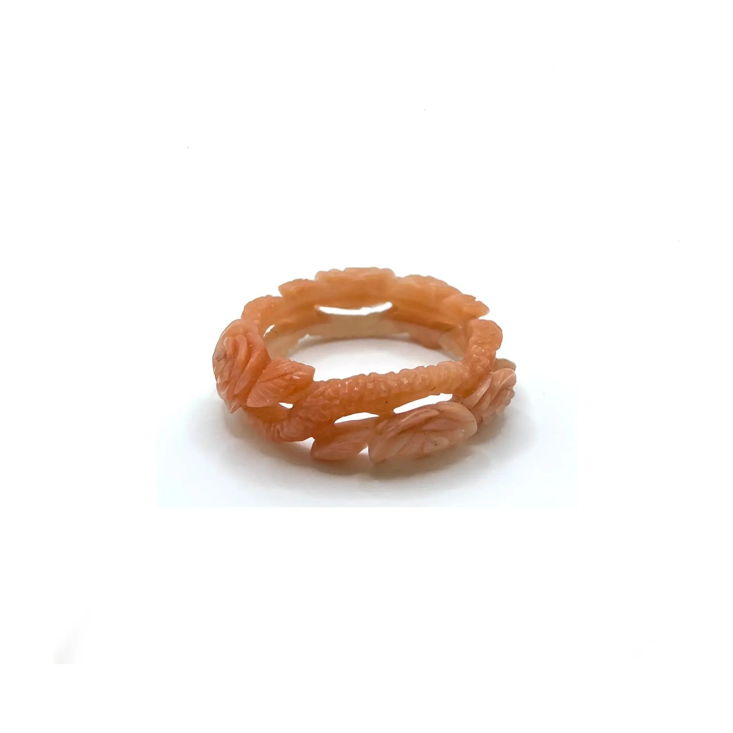 Carved bangle bracelet made from Mongolian jade quartzite, featuring hand-carved roses along a hollowed vine design in soft pink and orange tones.- Miruzi
