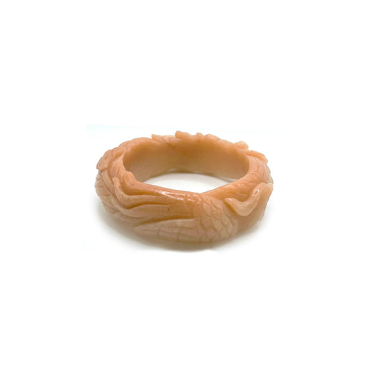 Carved jade bangle in Padparadscha-colored Mongolian jade quartzite, featuring detailed phoenix and peony carvings symbolizing rebirth, prosperity, and love. - Miruzi