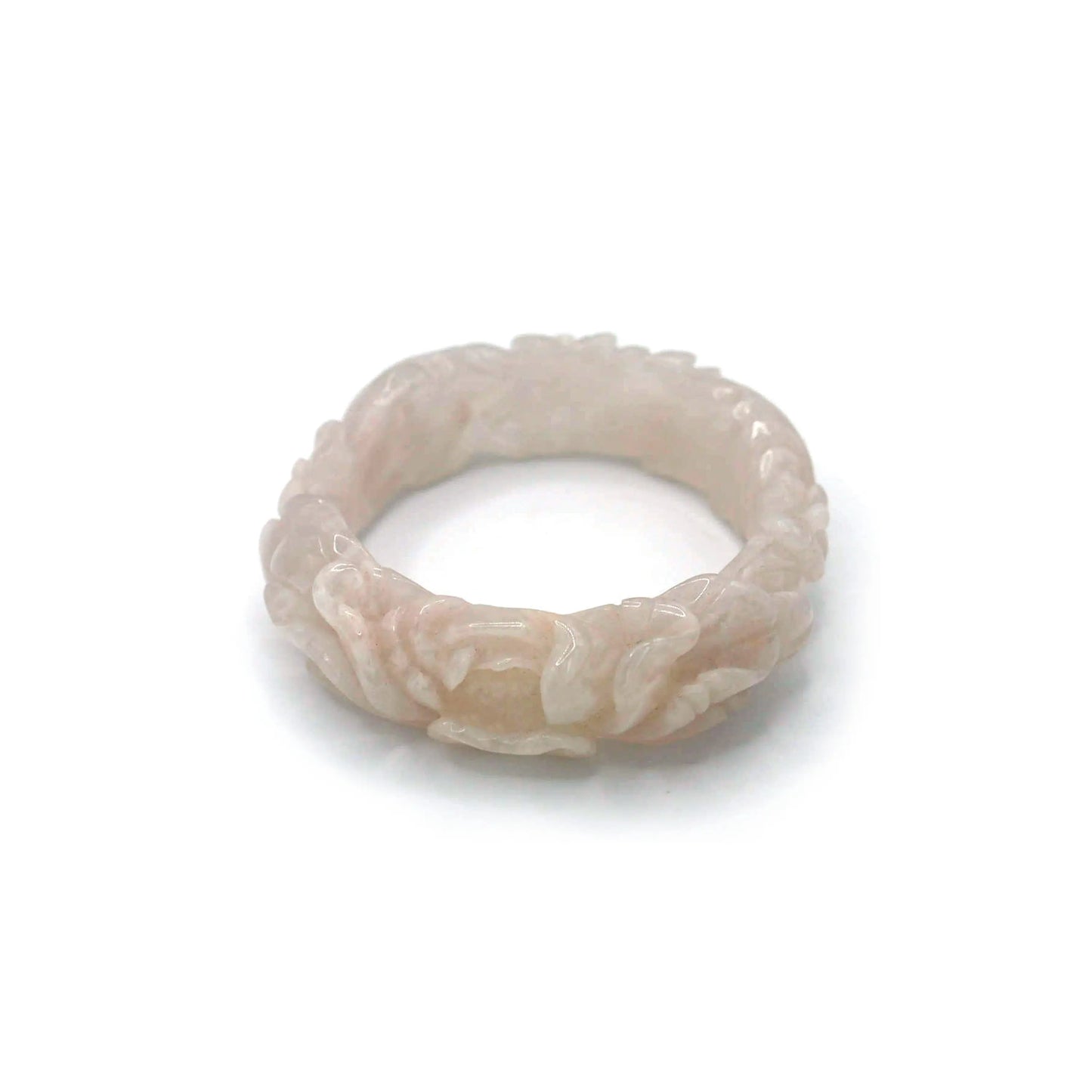 Elegant floral bangle in light pink Mongolian jade, handcrafted for refined minimalist styling