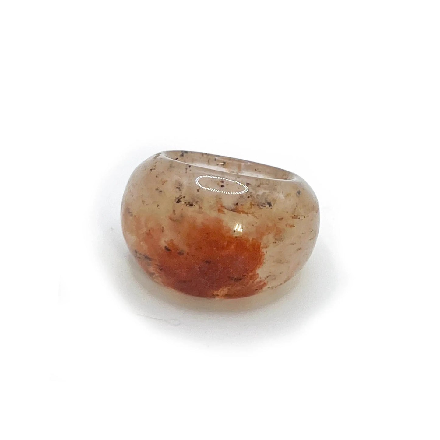 Stone statement ring carved from translucent Mongolian jade quartzite, featuring a red petal accent and mineral speckles that evoke a frost-covered natural surface. - Miruzi