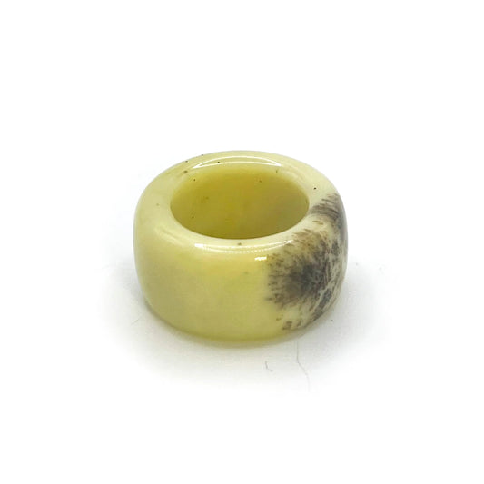 Natural jade ring with beige tone and blossom detail, handcrafted from serpentine stone for a calming, elegant look. - Miruzi