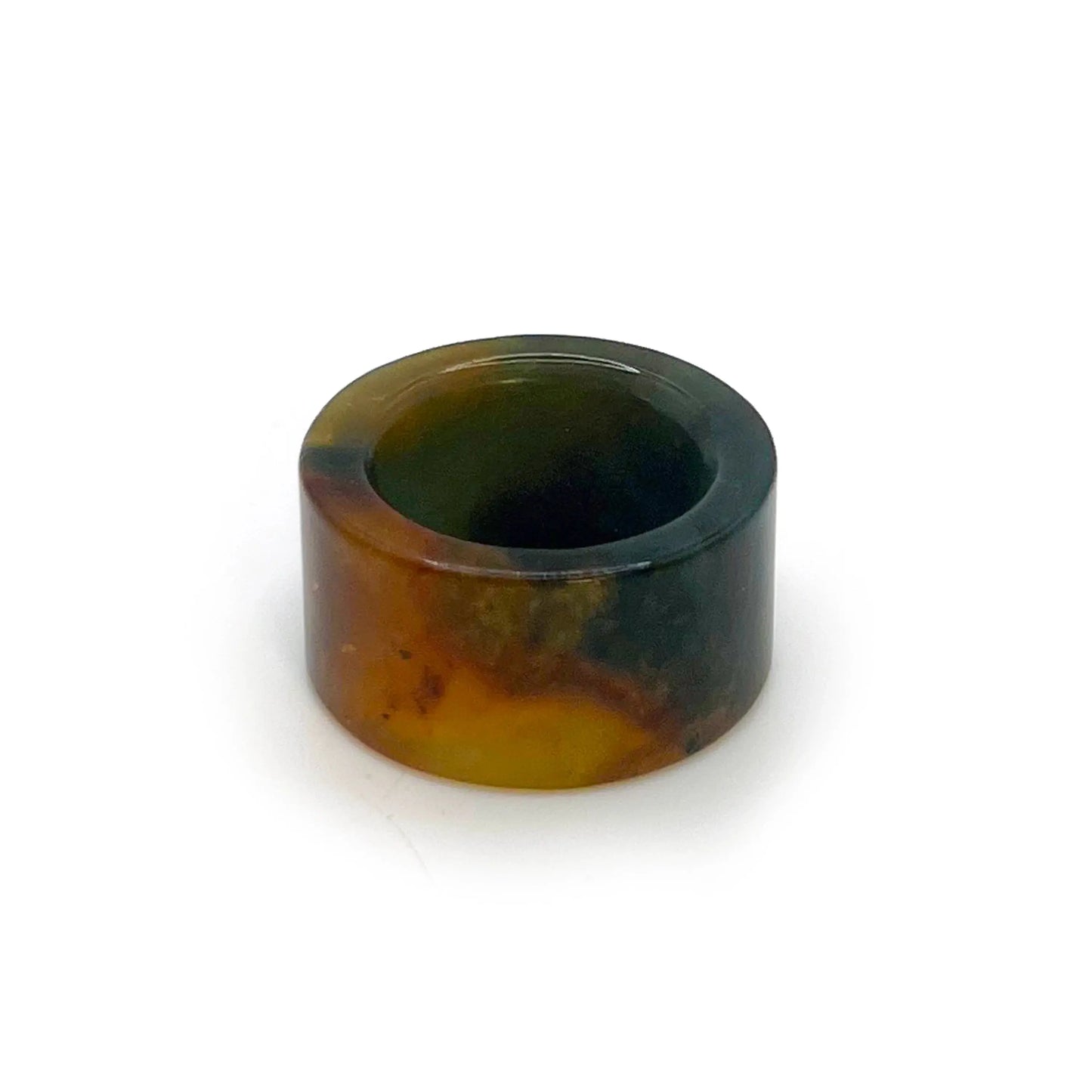 Multicolored serpentine jade band ring with celestial gradient.
