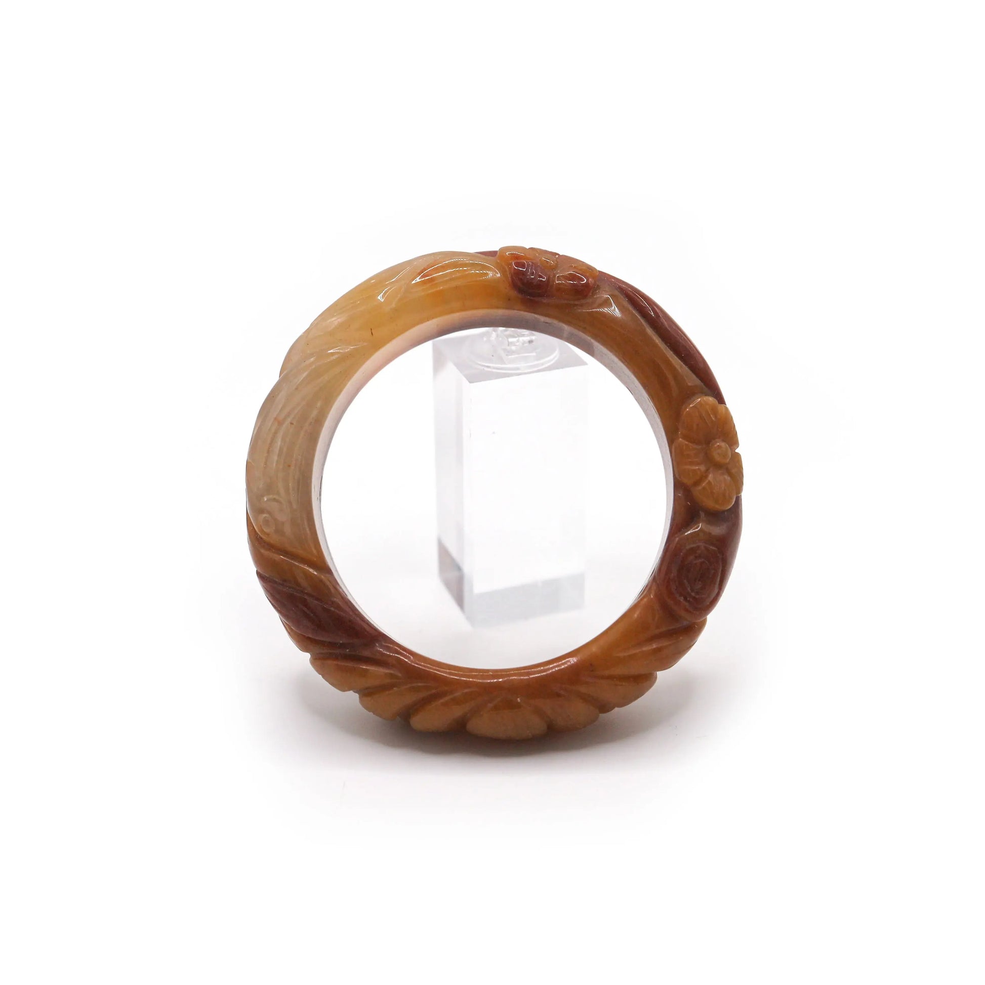 Full-circle orange jade bracelet with detailed lotus flower carving and partial icy glow, expressing joy, beauty, and energy – Miruzi