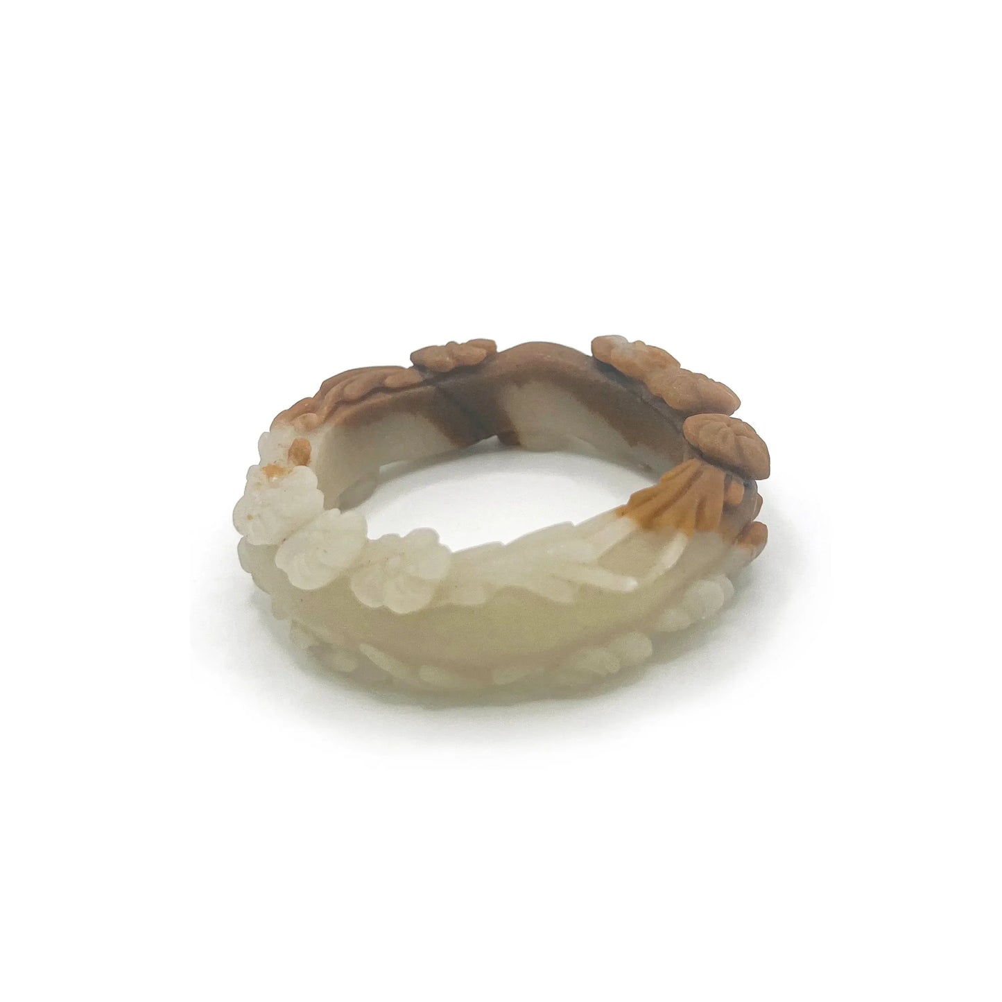 Carved jade bangle featuring three-dimensional floral motifs in warm caramel-colored Mongolian quartzite, hand-carved with an earthy and elegant finish.