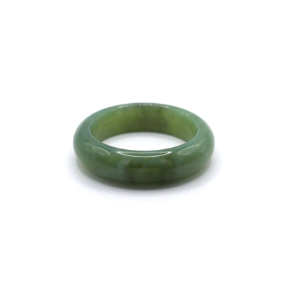 Light blue-green jade bracelet with translucent finish and subtle dark mineral spots Miruzi