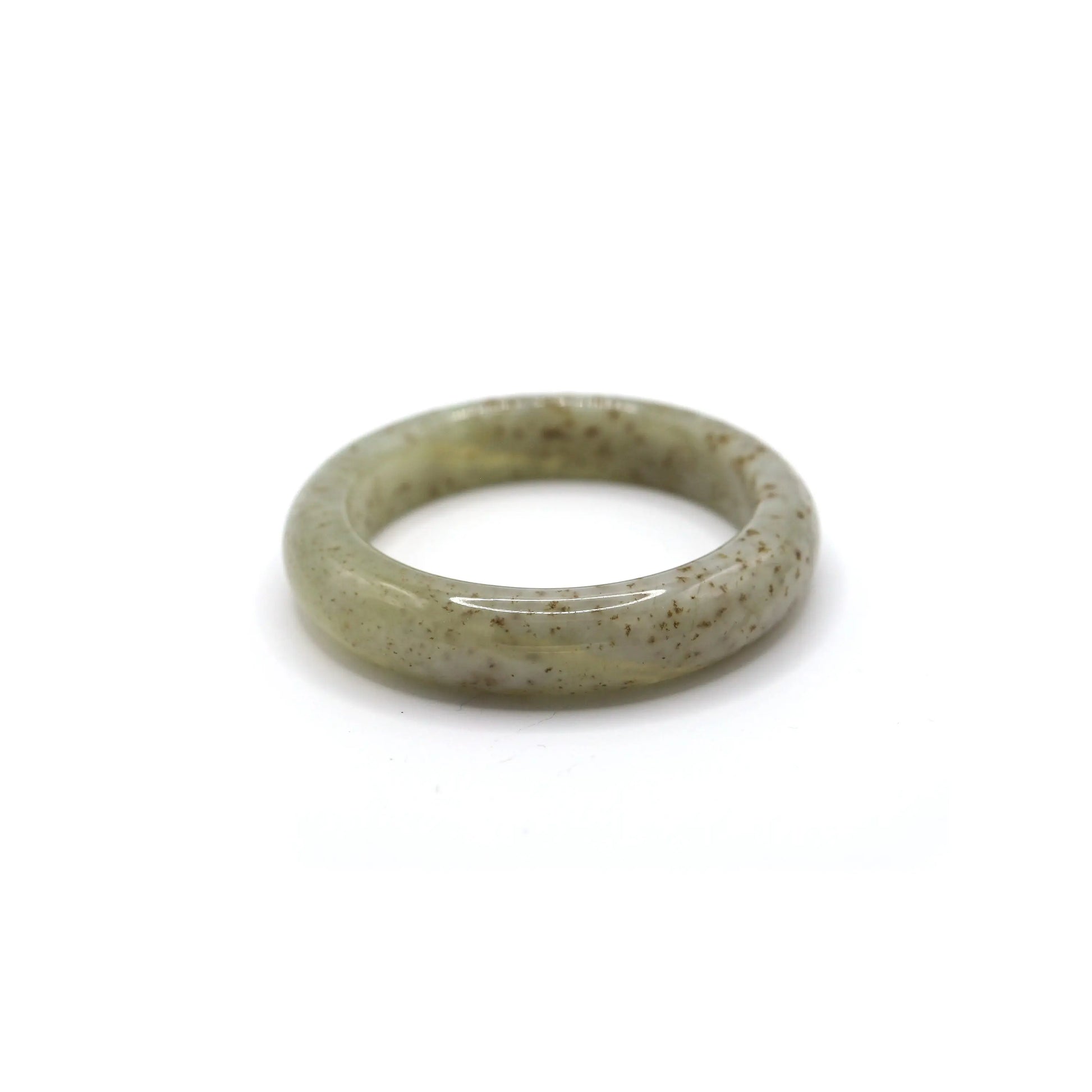 Jade bracelet with a see-through beige base and gentle mineral blooms, each fleck creating a unique floral rhythm – Miruzi